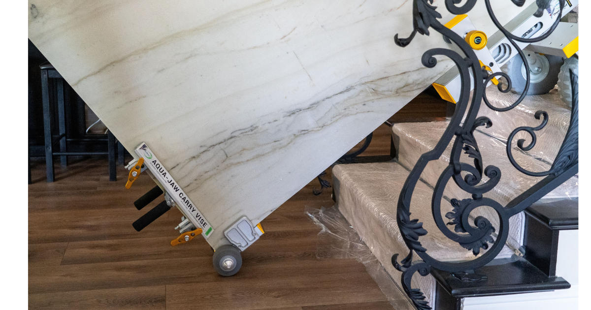 Omni Cubed Stair Ninja™ attached to slab material and rolling towards staircase