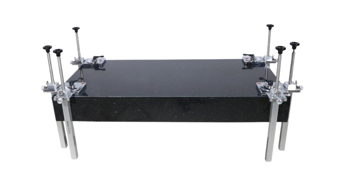 Black metal stand with multiple corner miter clamps attached on a white background