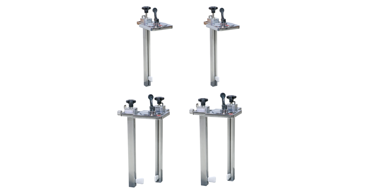 Four metal stands with adjustable knobs on a transparent background