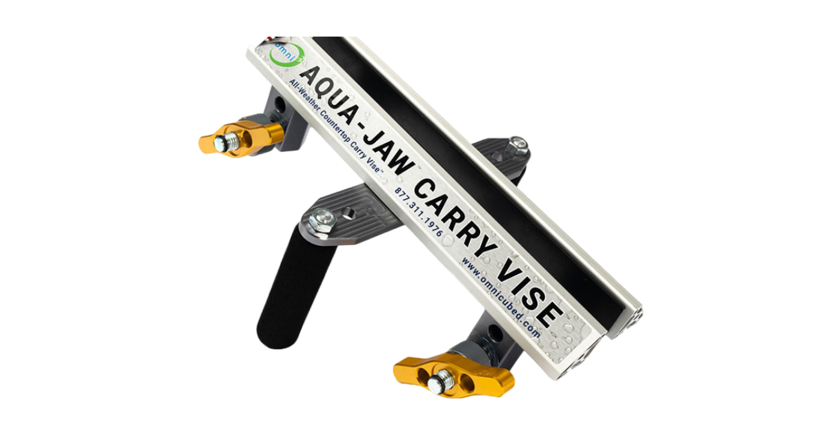 The Omni Cubed Aqua-Jaw Carry Vise, the highest capacity carry clamp available, is designed to securely hold wet stone without slipping, accommodating up to 800 pounds per pair.