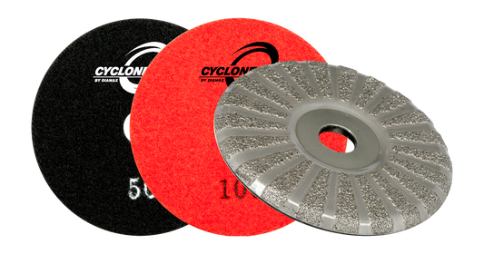 The Diamax Cyclone V2 Grinder is a versatile tool compatible with angle grinders and pneumatic machines, specifically engineered for grinding engineered stone, granite, porcelain, and ultra-compact materials.