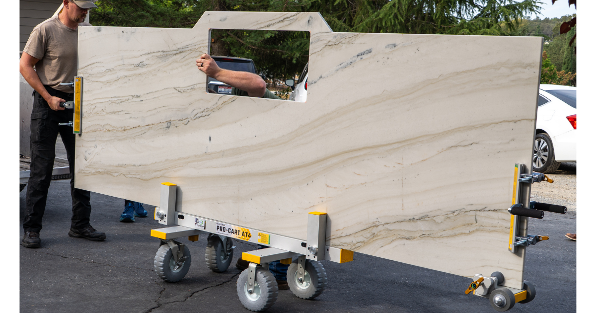 Omni Cubed Pro-Cart AT4 shown with a large slab loaded and men working