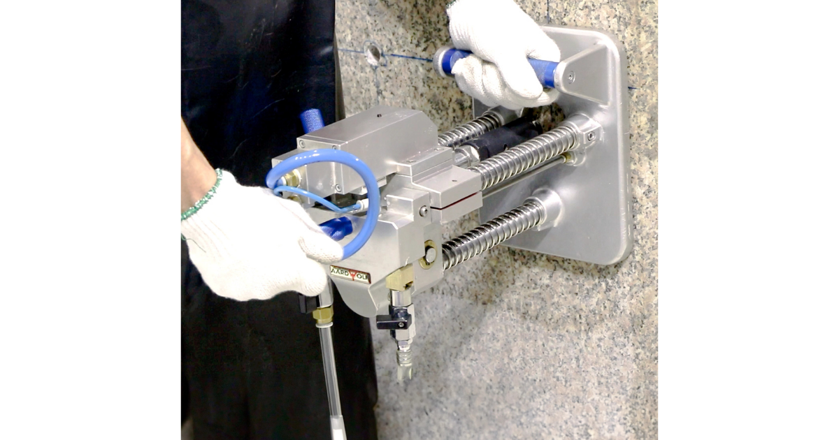 Aardwolf Portable Air Drill Machine APADM in action on a concrete wall