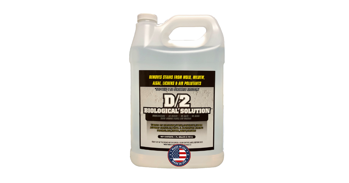 A gallon jug of D/2 Biological Solution on a plain white background. The jug is white plastic with a black and gold label and a circular American flag logo at the bottom.