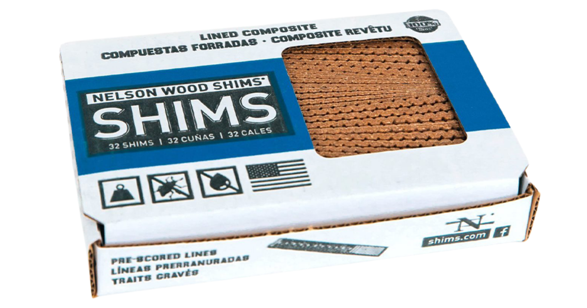 White Cardboard closed box with window showing composite shims inside box. Nelson Wood Shims blue, black and white writing on box