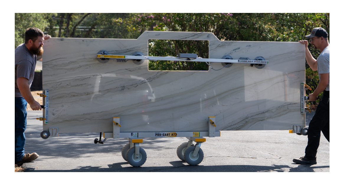 Omni Cubed Pro-Cart AT3 2 men wheeling slab across pavement on a pro-cart 3