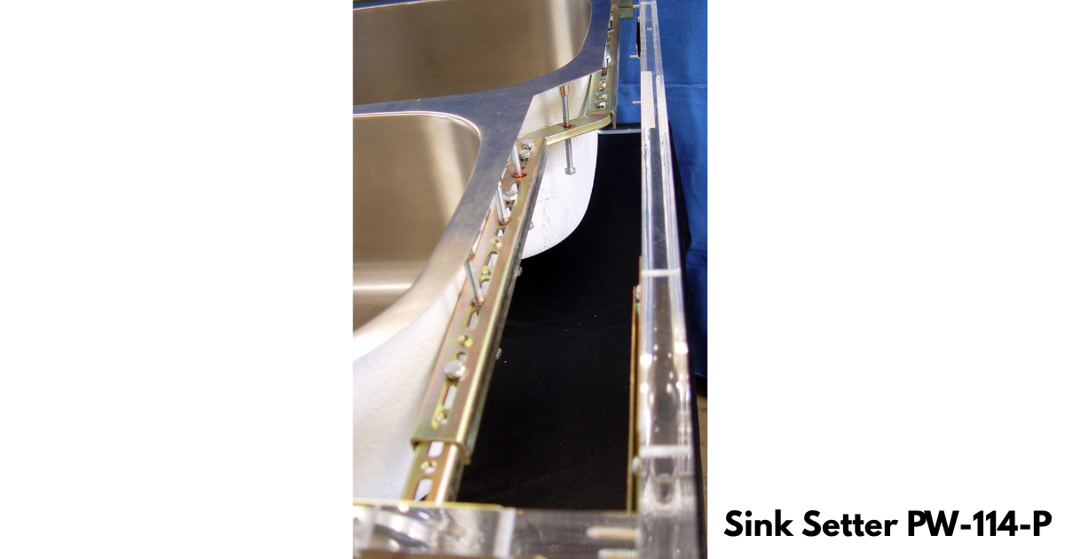 Back side length view of Sink Setter PW-114-P showing curved adjustable bracket, bolts and screws and sink in place