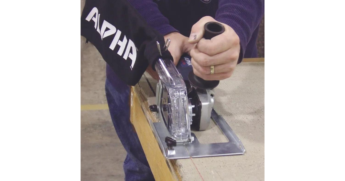 Man using the Alpha Ecoguard C Series to cut the edge of a countertop